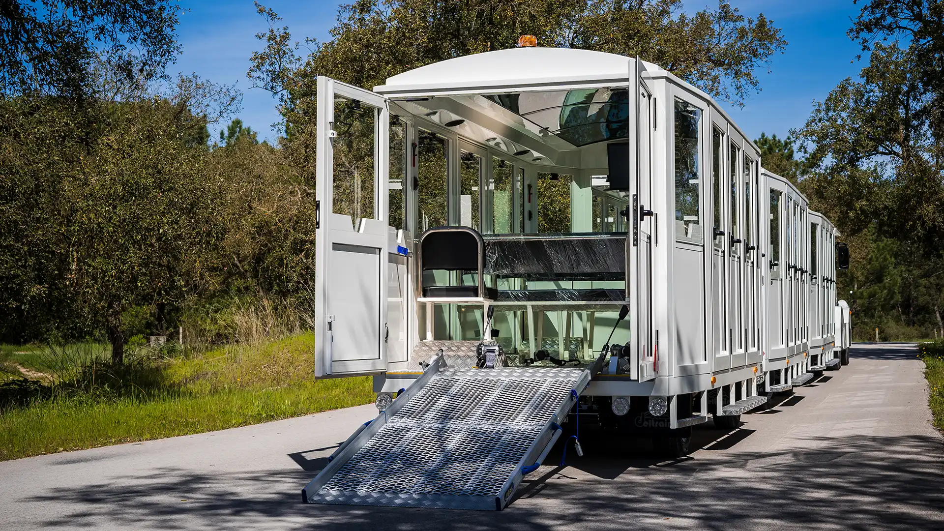 Rear view of Deltrain Diamond passenger wagon tourist train with enclosed cabins