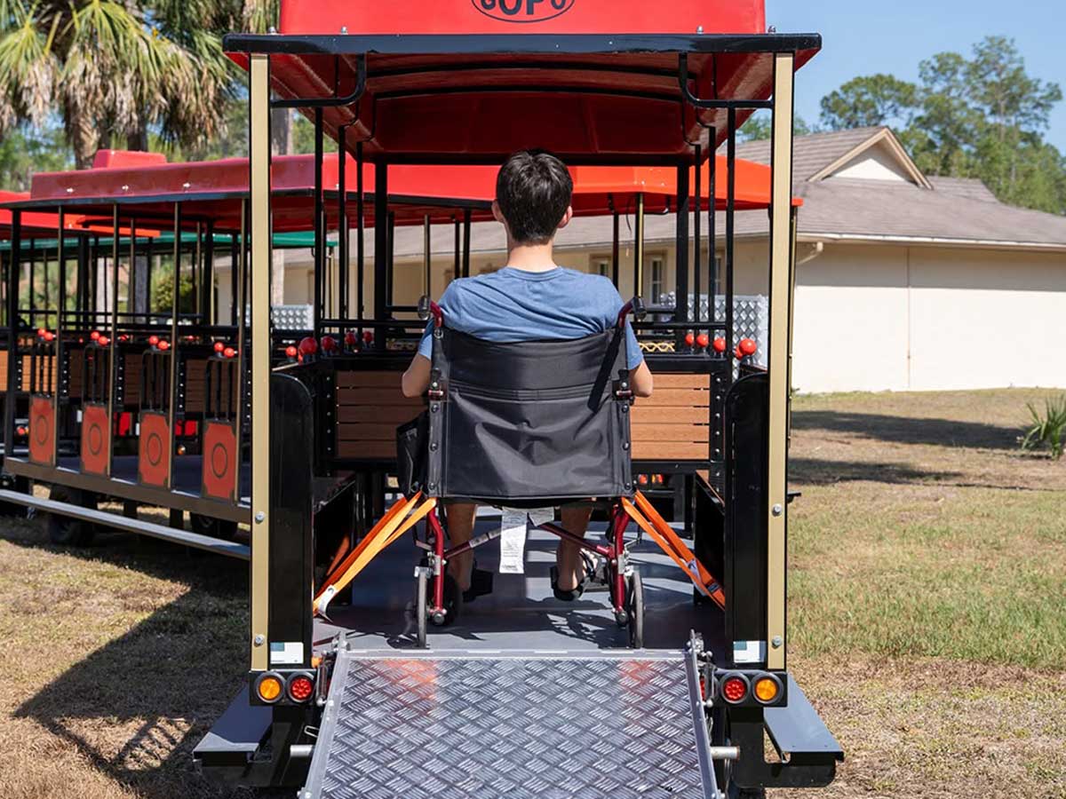 Wheelchair user boarding the FL15 coach via the rear ramp to the wheelchair position